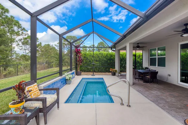 a view of outdoor space with garden and trees