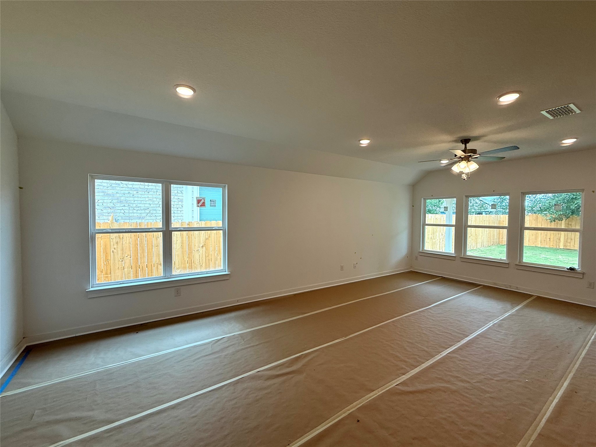 13615 Barn Chime Street Elgin, TX 78621 - Photo 4 of 8 a view of an empty room with a window