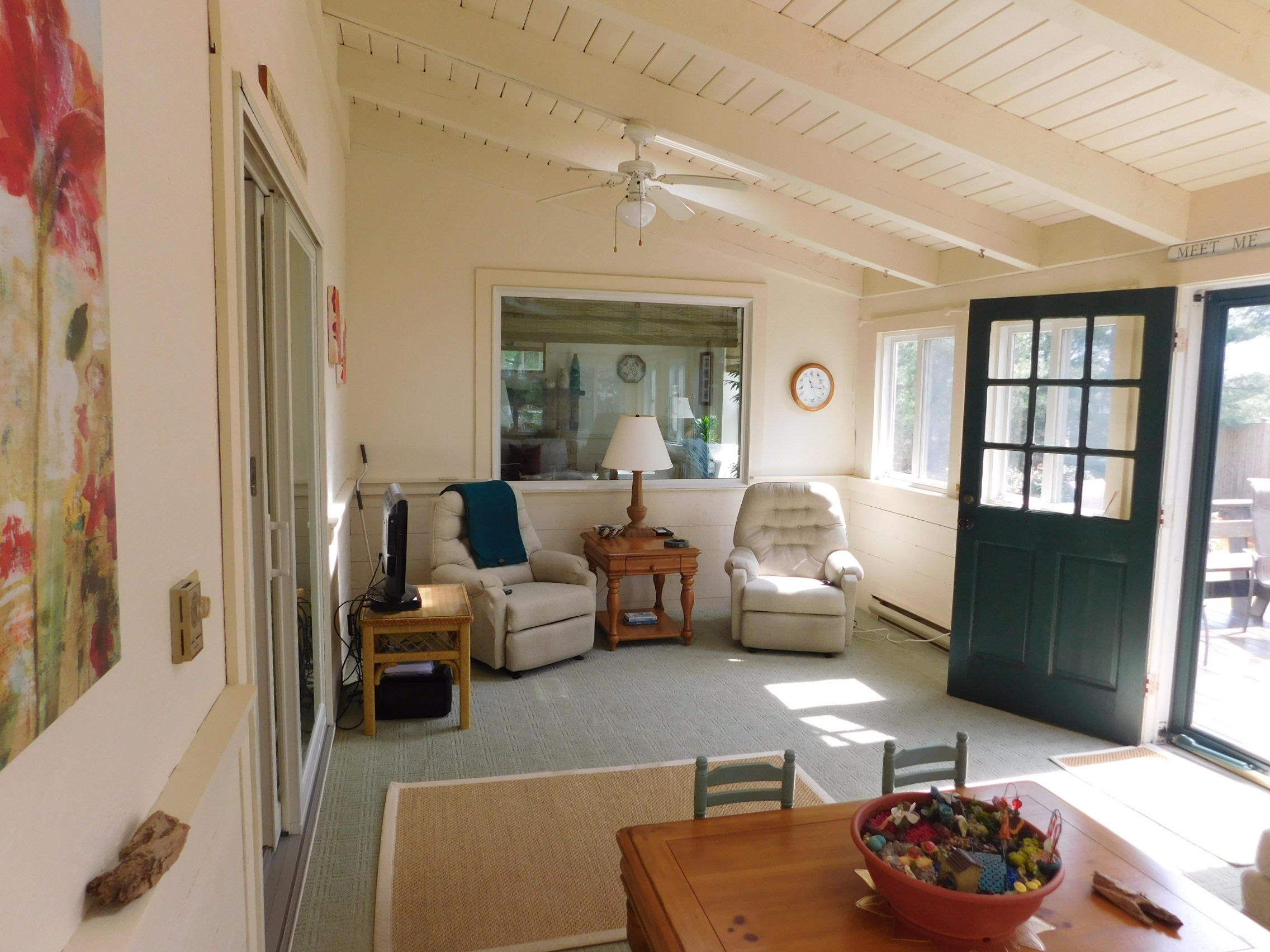 17 Captain Carltons Road Cotuit, MA 02635 - Photo 13 of 26 a living room with furniture and a large window