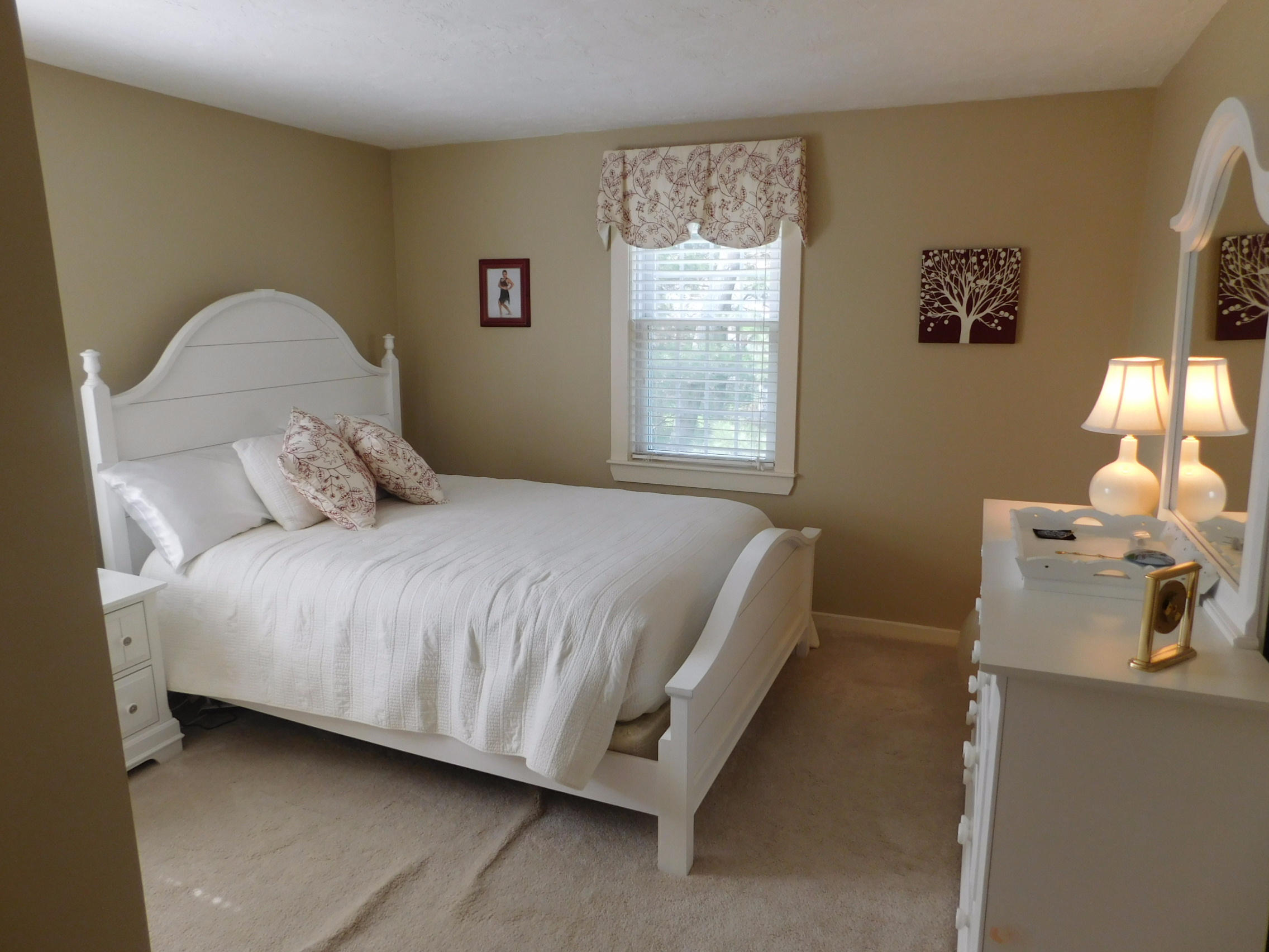 17 Captain Carltons Road Cotuit, MA 02635 - Photo 23 of 26 a bedroom with a bed and window