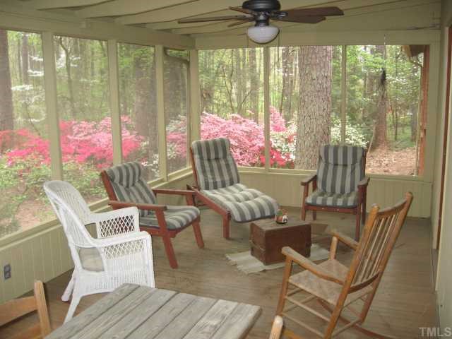 3115 Ridge Road Durham, NC 27705 - Photo 3 of 12 42' long screened porch overlooks the beautifully planted backyard. Almost 2 acres of landscaped bliss. Great potential in backyard to enhance the paths, gardens and put in a water feature.