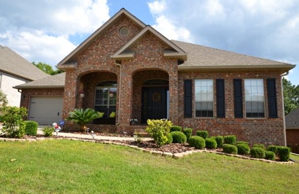 638 Red Fern Road Crestview, FL 32536 - Photo 1 of 55 a front view of a house with a yard