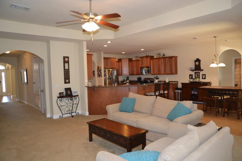 638 Red Fern Road Crestview, FL 32536 - Photo 15 of 55 a living room with furniture and kitchen view