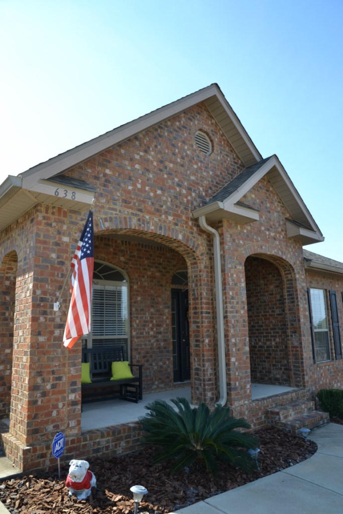 638 Red Fern Road Crestview, FL 32536 - Photo 3 of 55 a front view of a house with garden