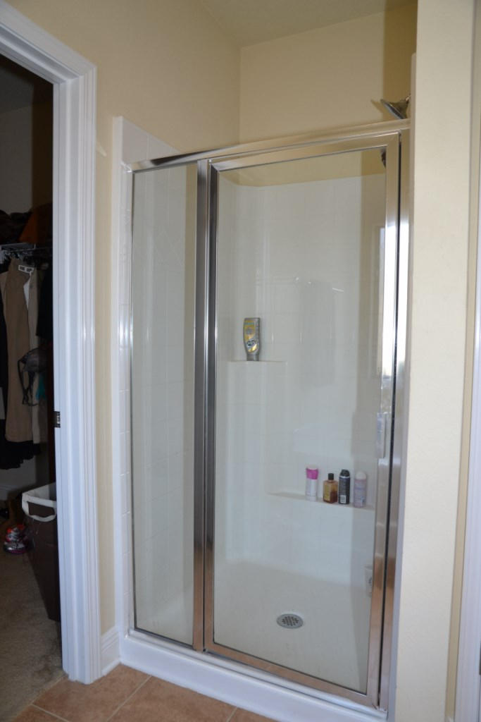638 Red Fern Road Crestview, FL 32536 - Photo 31 of 55 a bathroom with a glass shower door