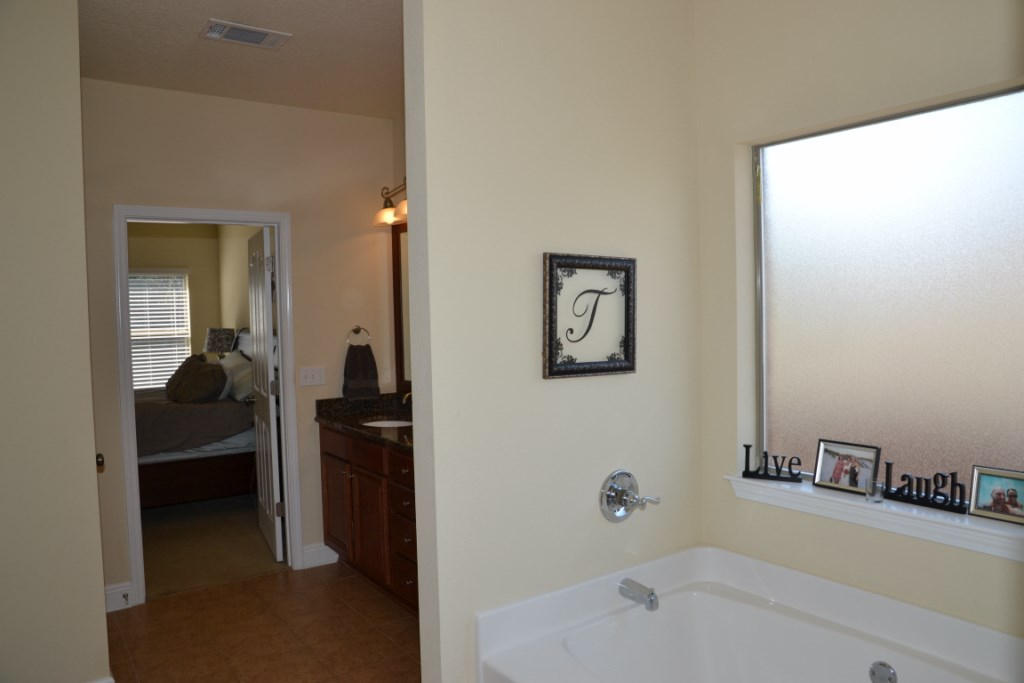 638 Red Fern Road Crestview, FL 32536 - Photo 32 of 55 a bathroom with a sink and a tub
