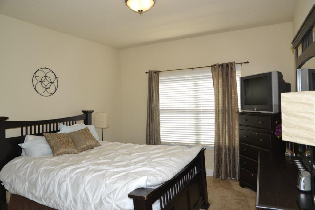638 Red Fern Road Crestview, FL 32536 - Photo 33 of 55 a bedroom with a bed and a window