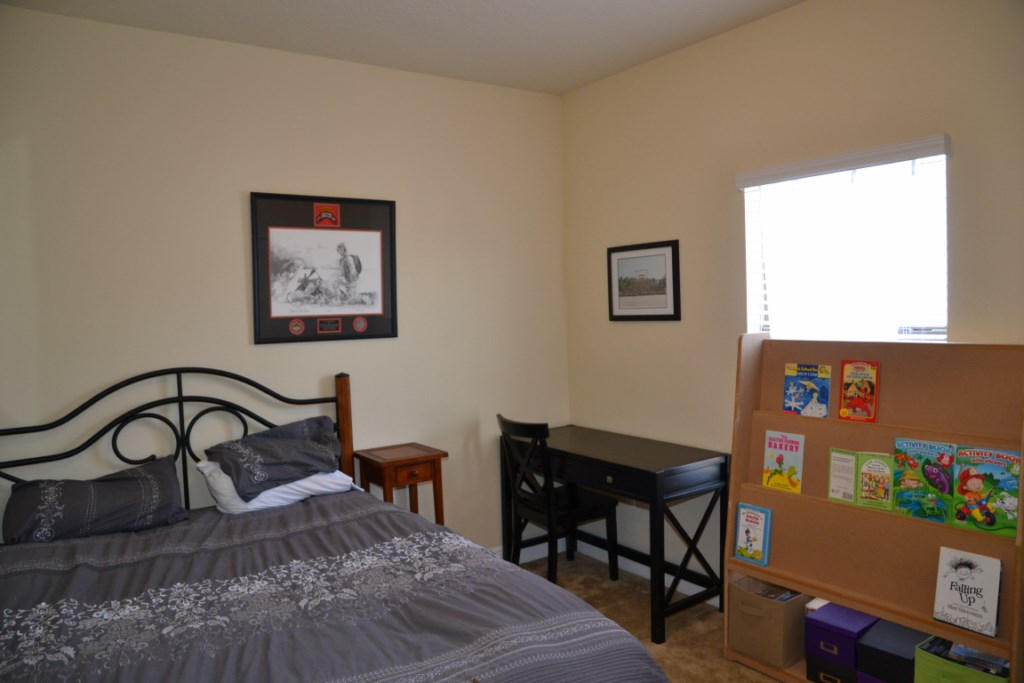 638 Red Fern Road Crestview, FL 32536 - Photo 38 of 55 a view of a workspace room with furniture and wooden floor