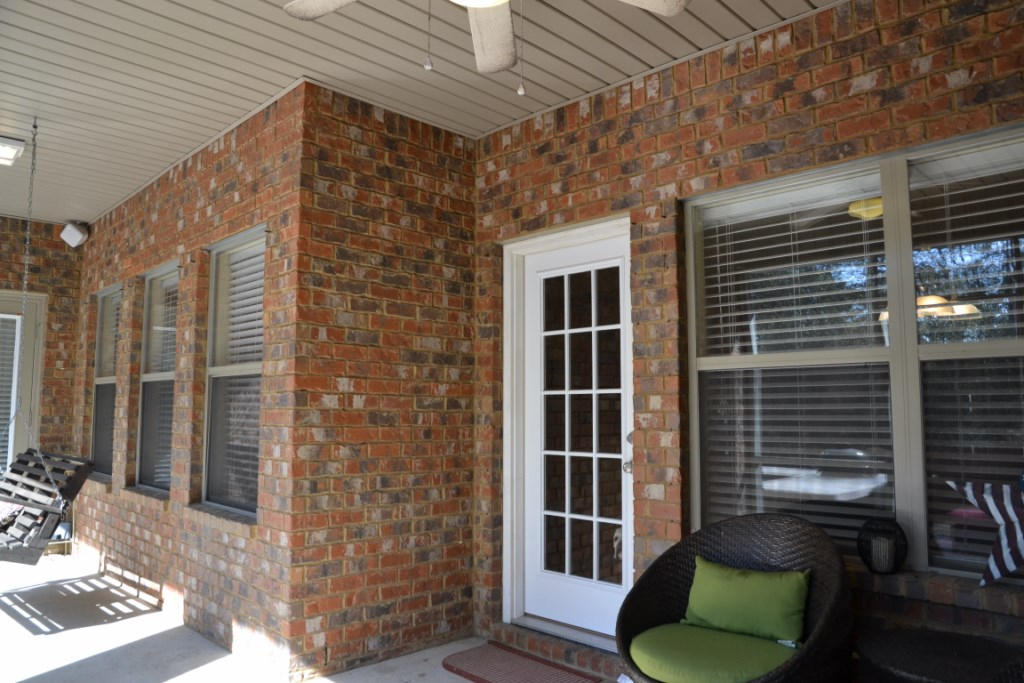638 Red Fern Road Crestview, FL 32536 - Photo 44 of 55 a balcony with couch and a potted plant