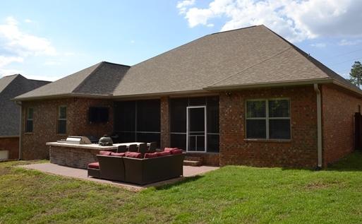 638 Red Fern Road Crestview, FL 32536 - Photo 49 of 55 a backyard of a house with table and chairs