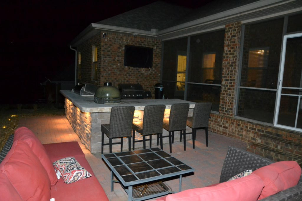 638 Red Fern Road Crestview, FL 32536 - Photo 6 of 55 a living room with furniture a flat screen tv and a fireplace