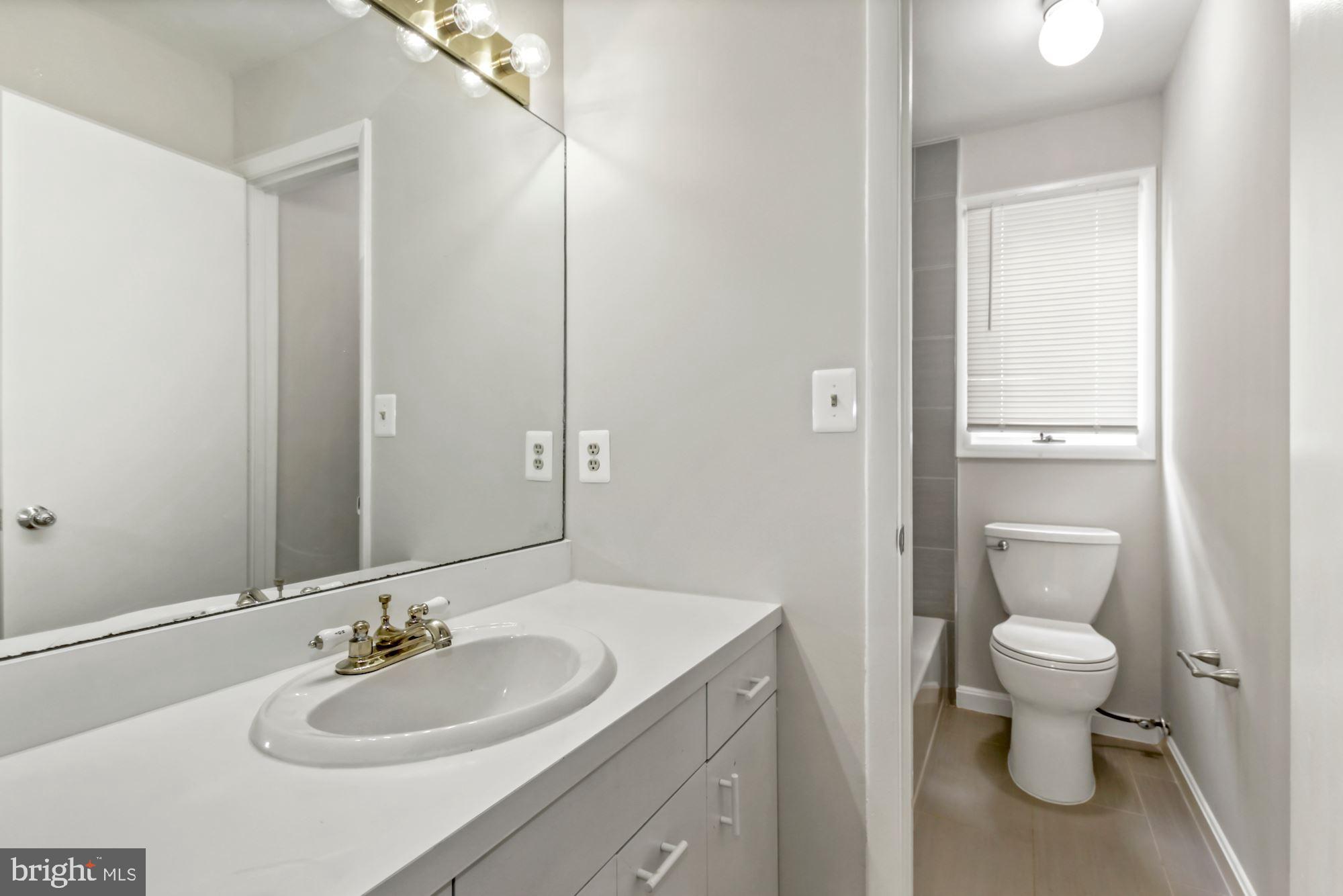 6203 Winston Drive Bethesda, MD 20817 - Photo 18 of 35 Main-level 2nd bathroom