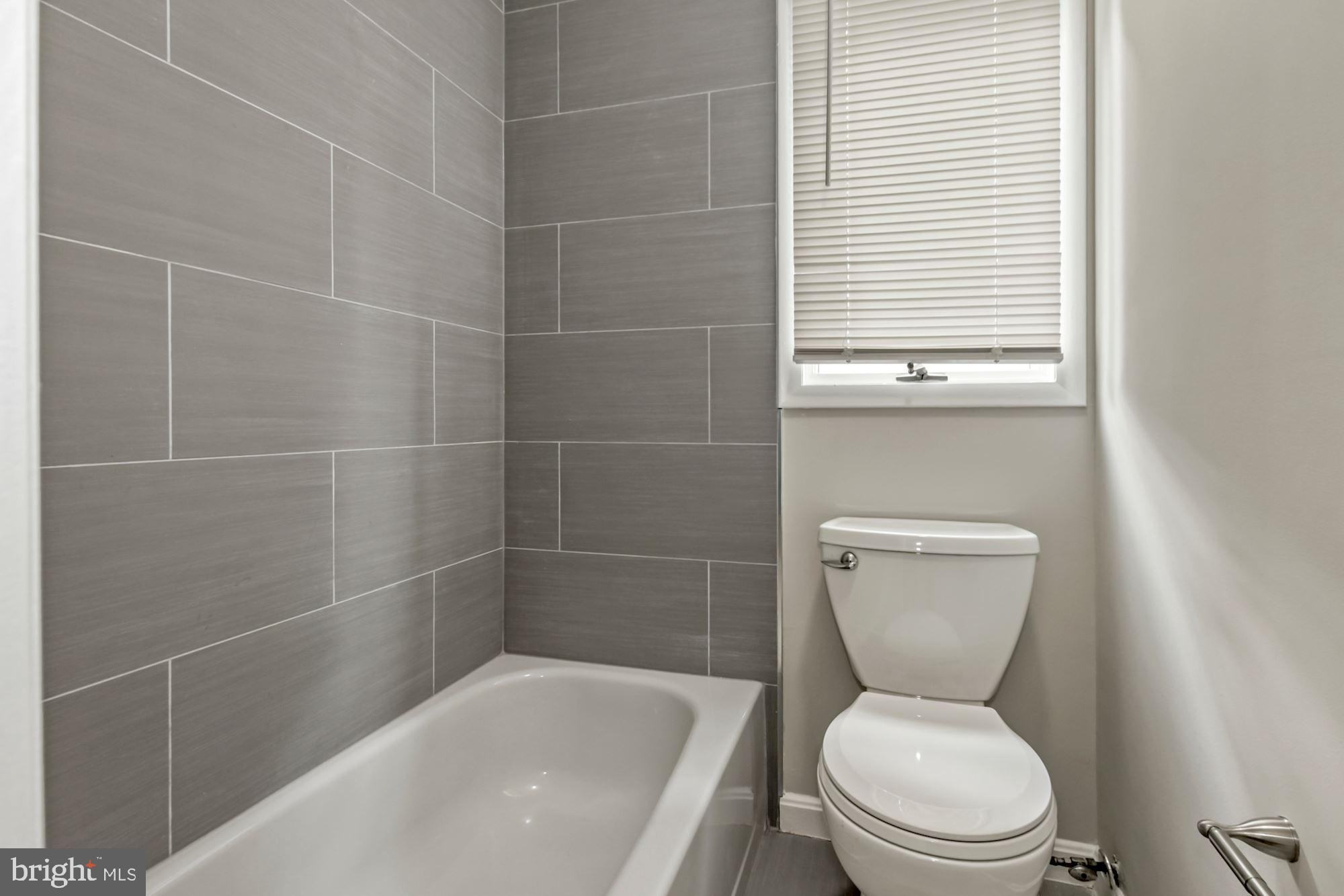 6203 Winston Drive Bethesda, MD 20817 - Photo 19 of 35 Tub with Updated Tile