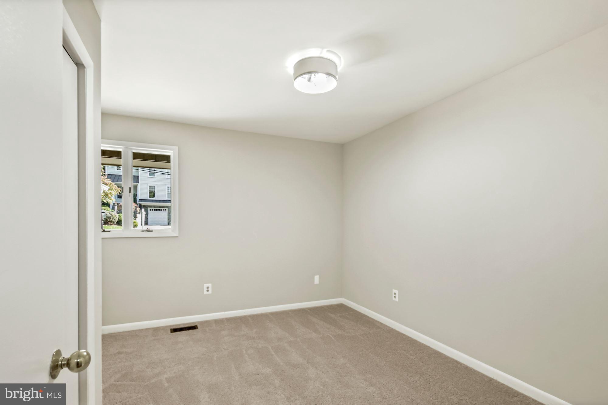 6203 Winston Drive Bethesda, MD 20817 - Photo 20 of 35 Main-level 3rd Bedroom or office w new carpet