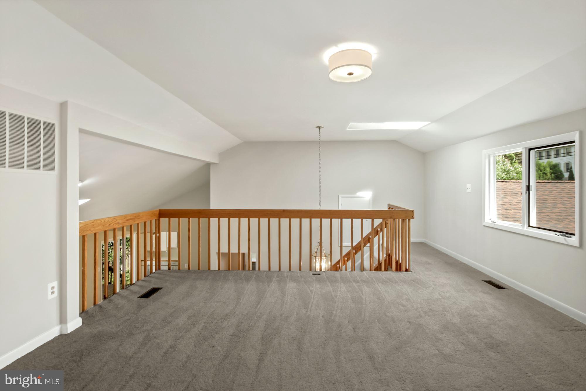 6203 Winston Drive Bethesda, MD 20817 - Photo 22 of 35 Upper-level loft area w new carpet