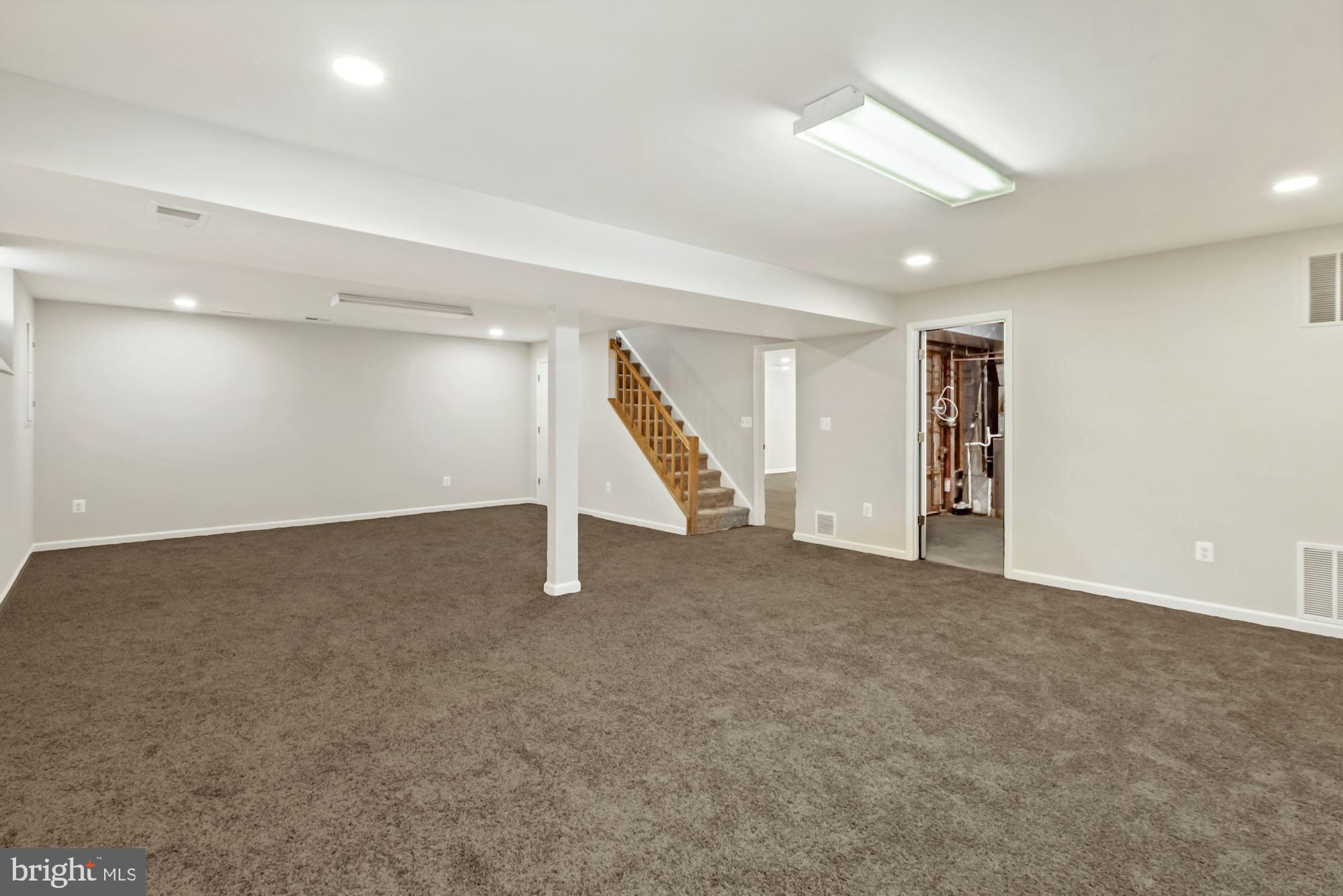 6203 Winston Drive Bethesda, MD 20817 - Photo 25 of 35 Lower-level recreation room