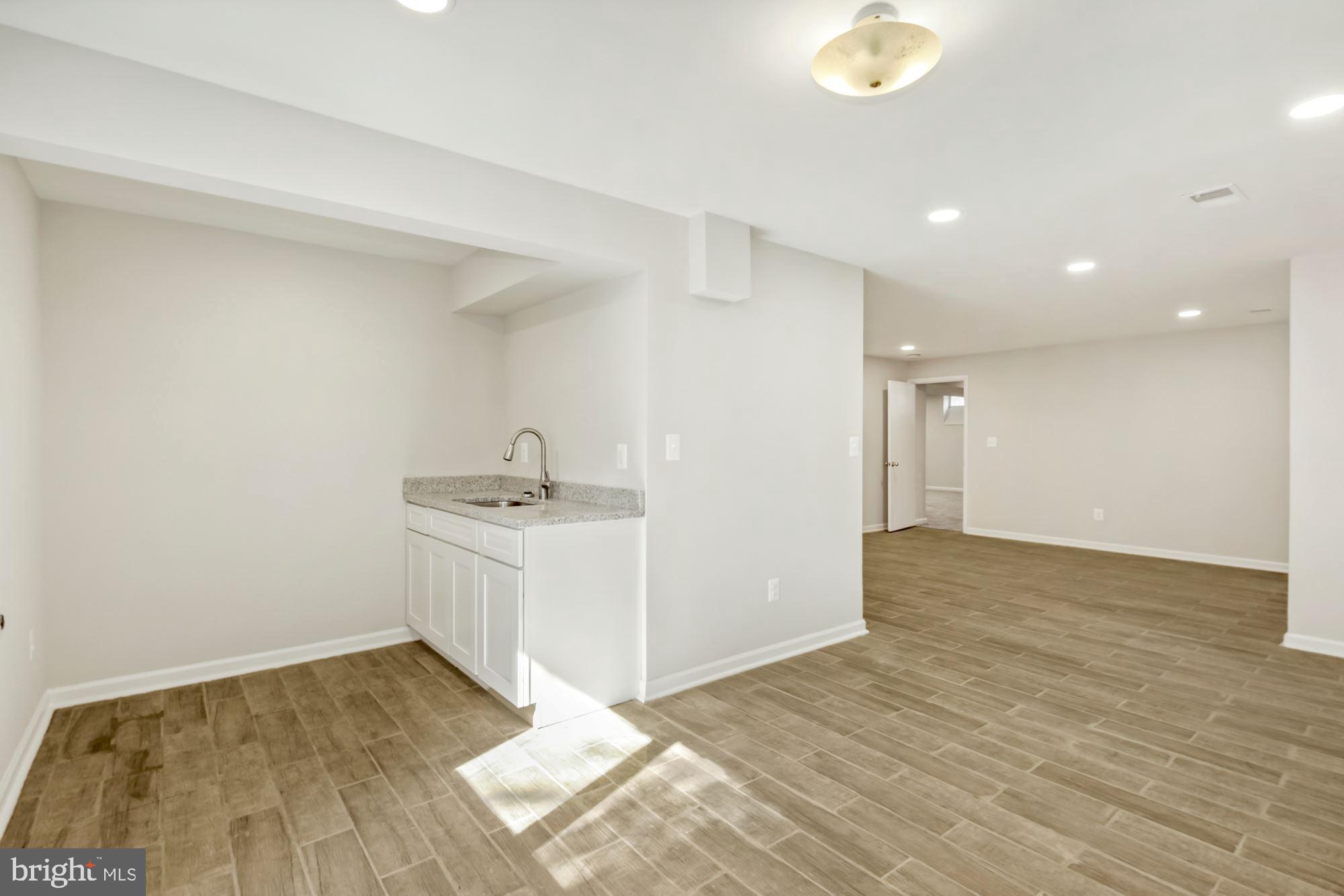 6203 Winston Drive Bethesda, MD 20817 - Photo 27 of 35 Lower-level kitchen
