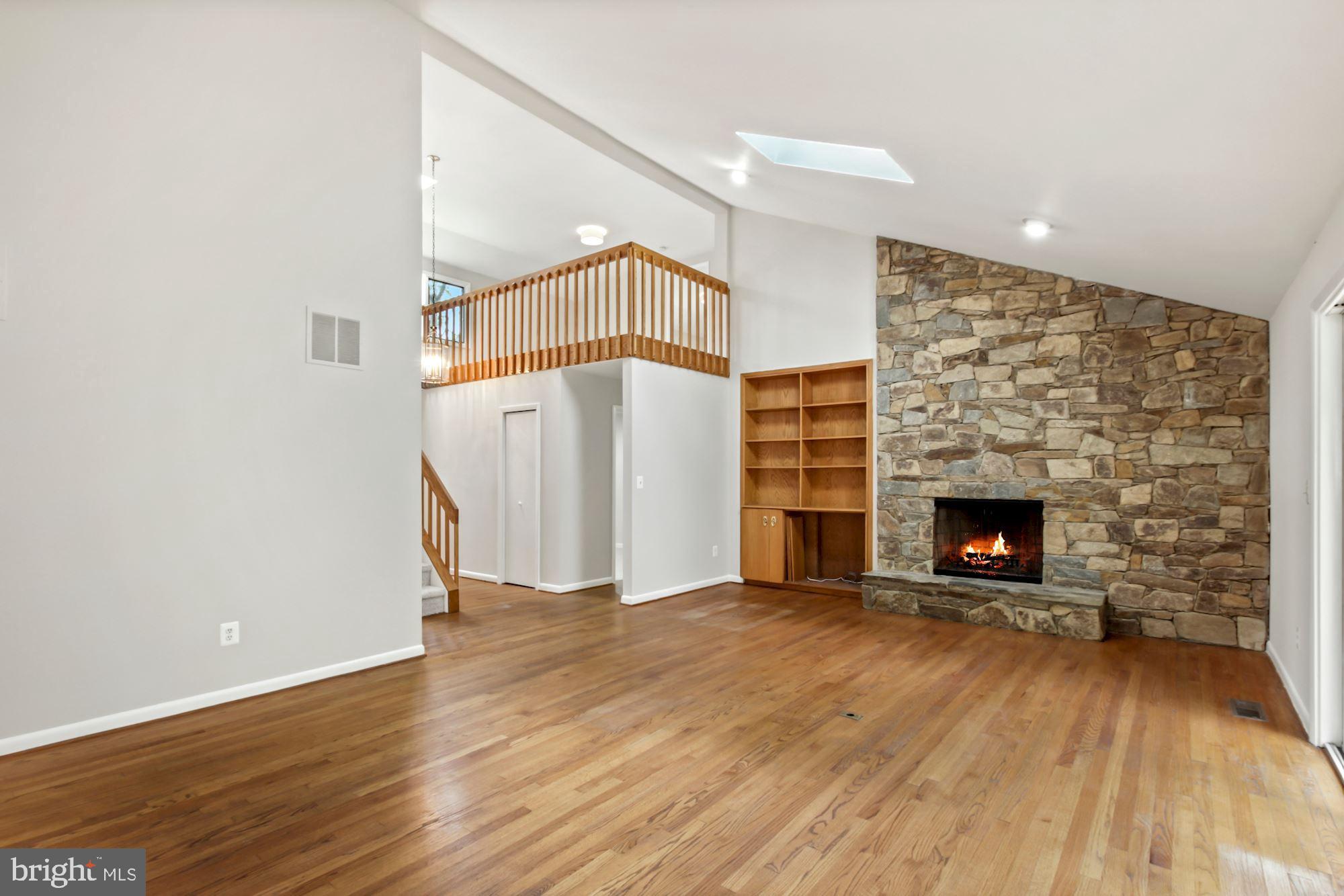 6203 Winston Drive Bethesda, MD 20817 - Photo 5 of 35 Stone Wood-burning Fireplace with Built in
