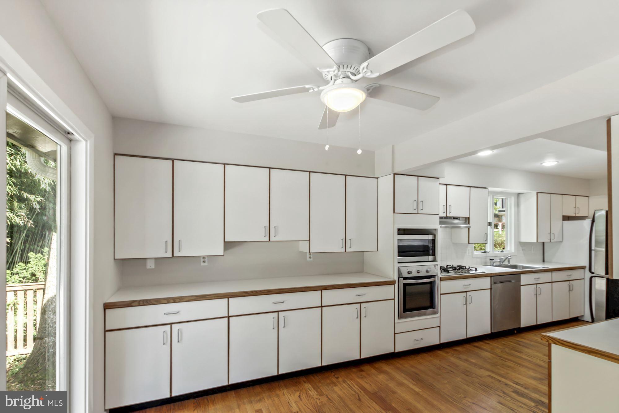 6203 Winston Drive Bethesda, MD 20817 - Photo 7 of 35 Large Kitchen with Stainless Steel appliances