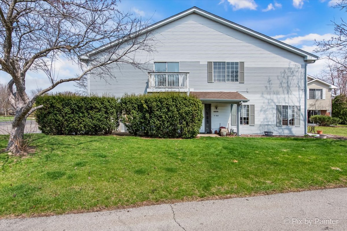 6-s018 Steeple Run Drive, Unit 6S018 Naperville, IL 60540 - Photo 1 of 22 a view of a yard in front of a house