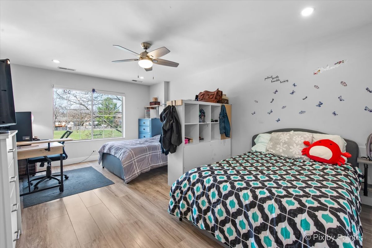 6-s018 Steeple Run Drive, Unit 6S018 Naperville, IL 60540 - Photo 13 of 22 a bedroom with furniture and a window