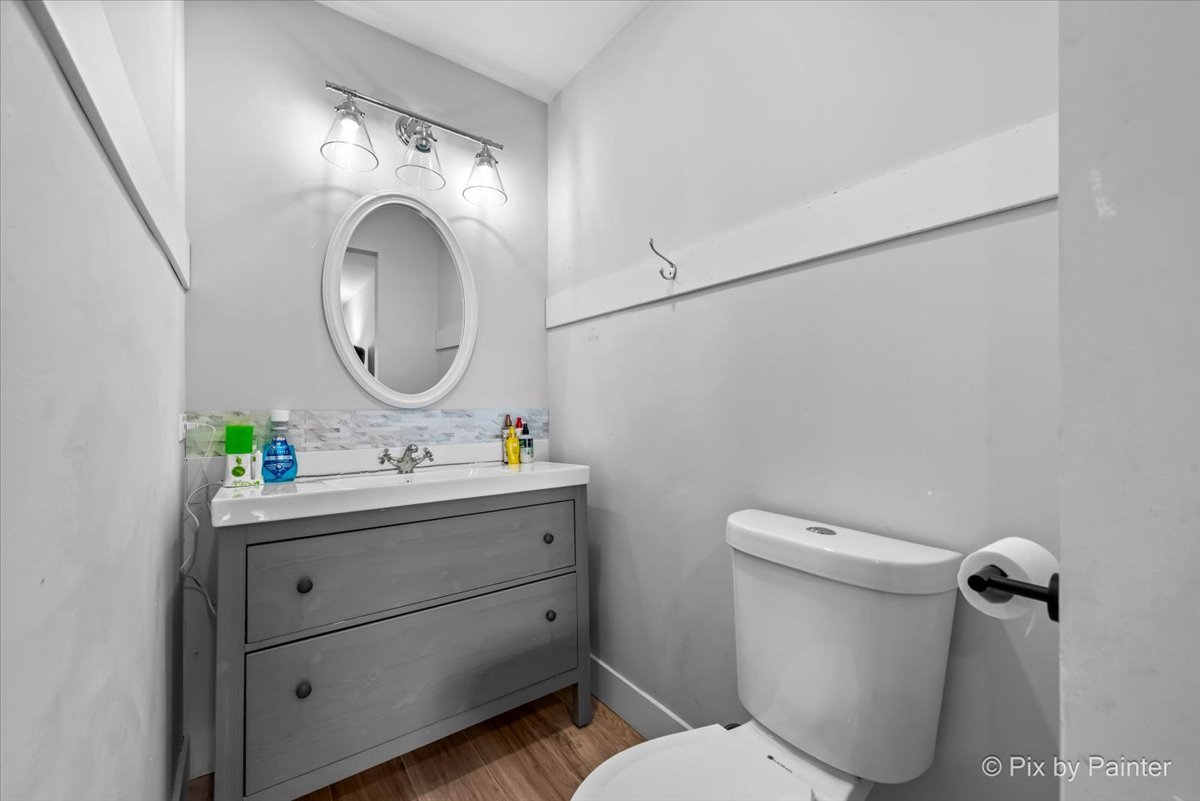 6-s018 Steeple Run Drive, Unit 6S018 Naperville, IL 60540 - Photo 15 of 22 a bathroom with a toilet sink and mirror