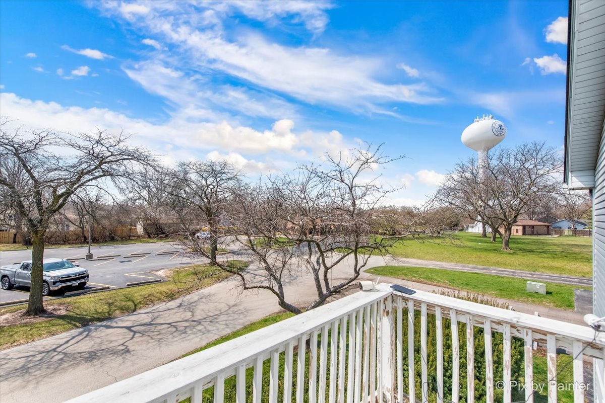 6-s018 Steeple Run Drive, Unit 6S018 Naperville, IL 60540 - Photo 19 of 22 a view of a pathway with a yard