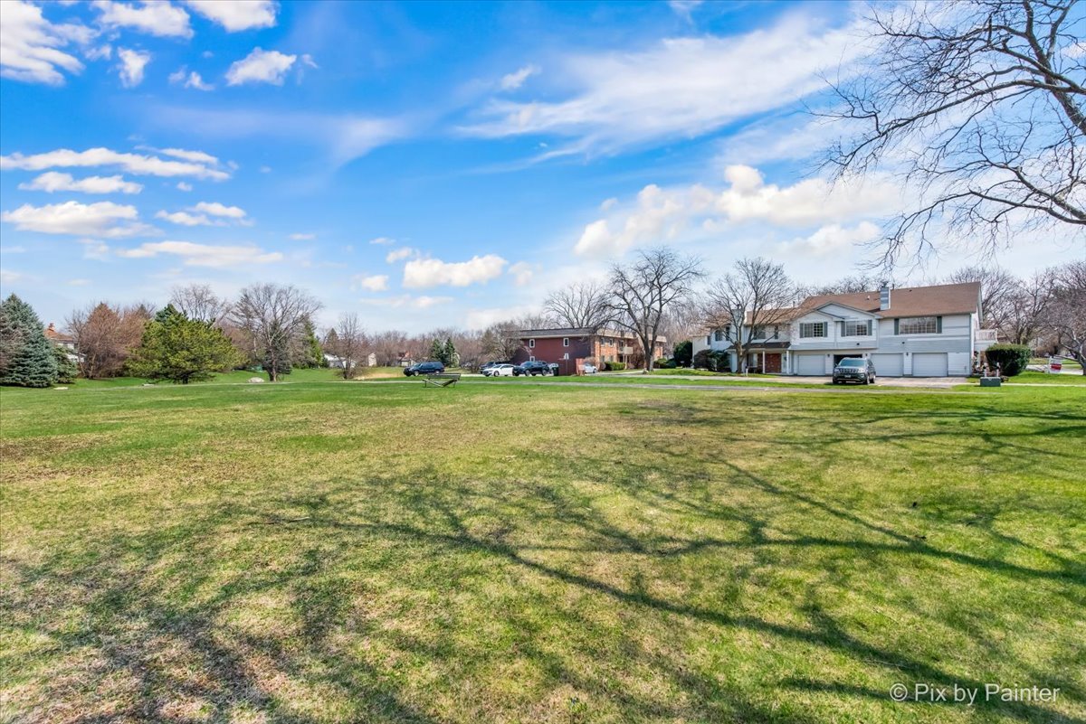 6-s018 Steeple Run Drive, Unit 6S018 Naperville, IL 60540 - Photo 20 of 22 a view of a field with sitting area