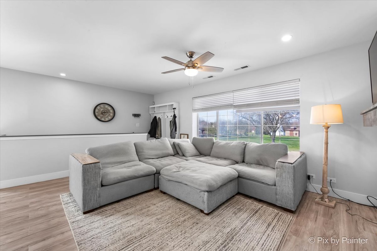 6-s018 Steeple Run Drive, Unit 6S018 Naperville, IL 60540 - Photo 4 of 22 a living room with furniture and a large window