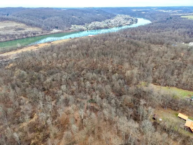 a view of a backyard of a house