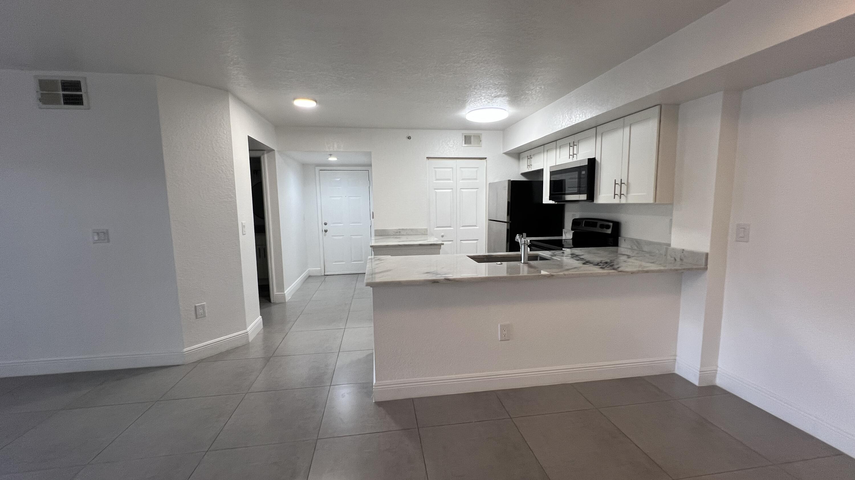 191 Southwest Palm Drive, Unit 105 Port St. Lucie, FL 34986 - Photo 4 of 23 IMG_9921