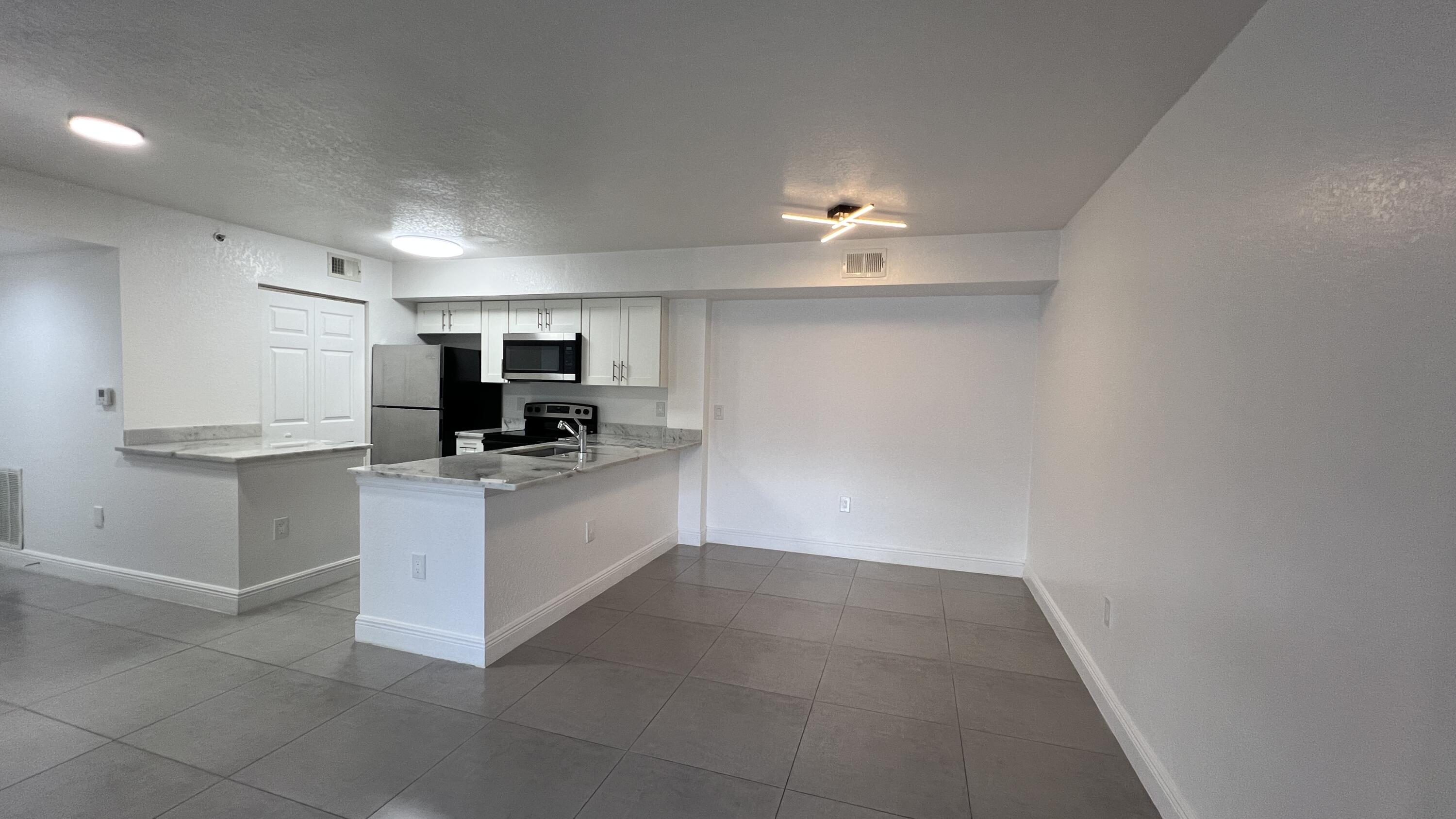 191 Southwest Palm Drive, Unit 105 Port St. Lucie, FL 34986 - Photo 7 of 23 IMG_9920