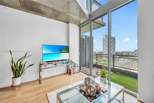 a view of a kitchen with a sink