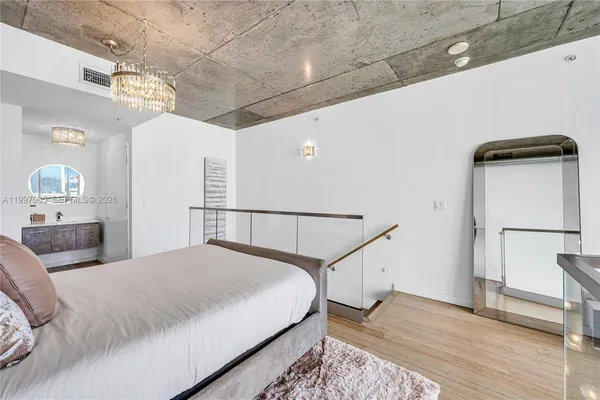a view of a patio with couches table and chairs and potted plants