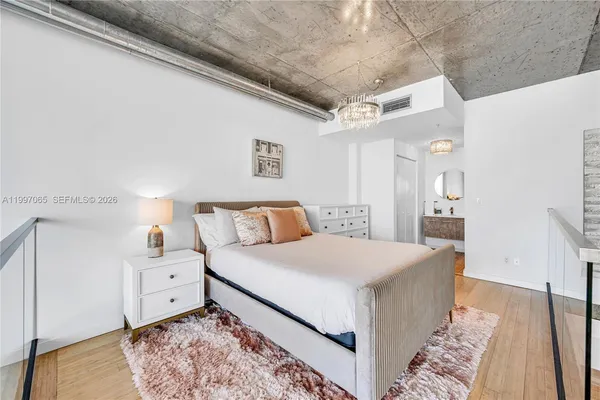 a view of swimming pool with outdoor seating and city view