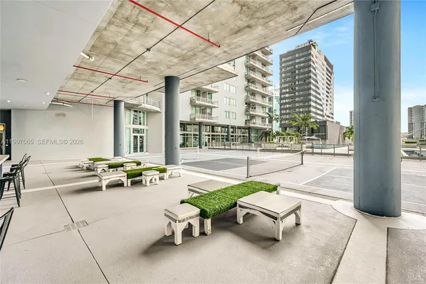 a view of a building with a yard