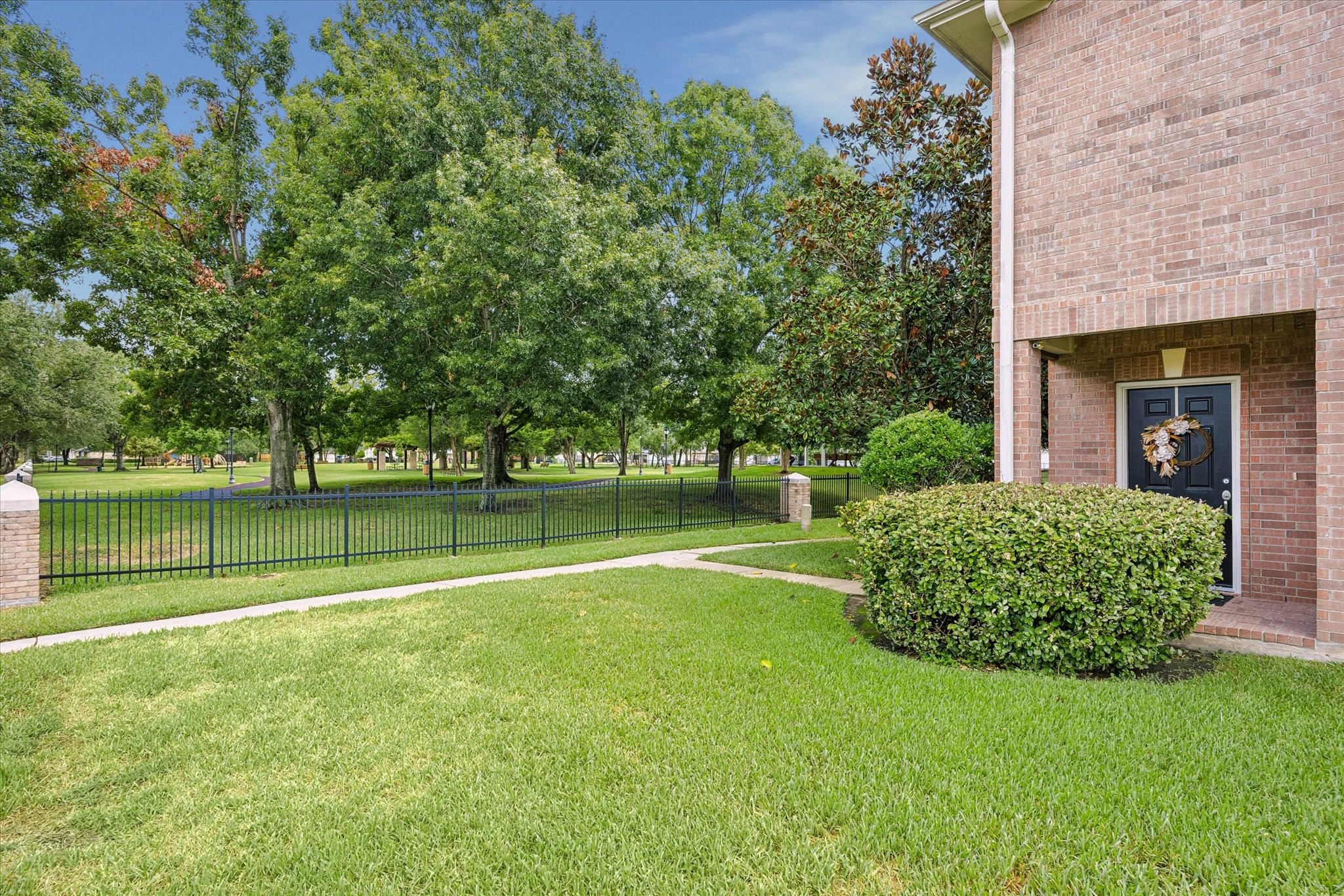 A standout feature of this end unit—the neighborhood park is right outside. HOA fee mows all outside of your fenced back yard too