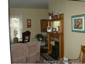 85 Rr 1 Springville, PA 18844 - Photo 3 of 6 a living room with furniture and a chandelier
