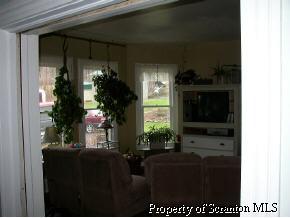 85 Rr 1 Springville, PA 18844 - Photo 5 of 6 a living room with furniture and a potted plant