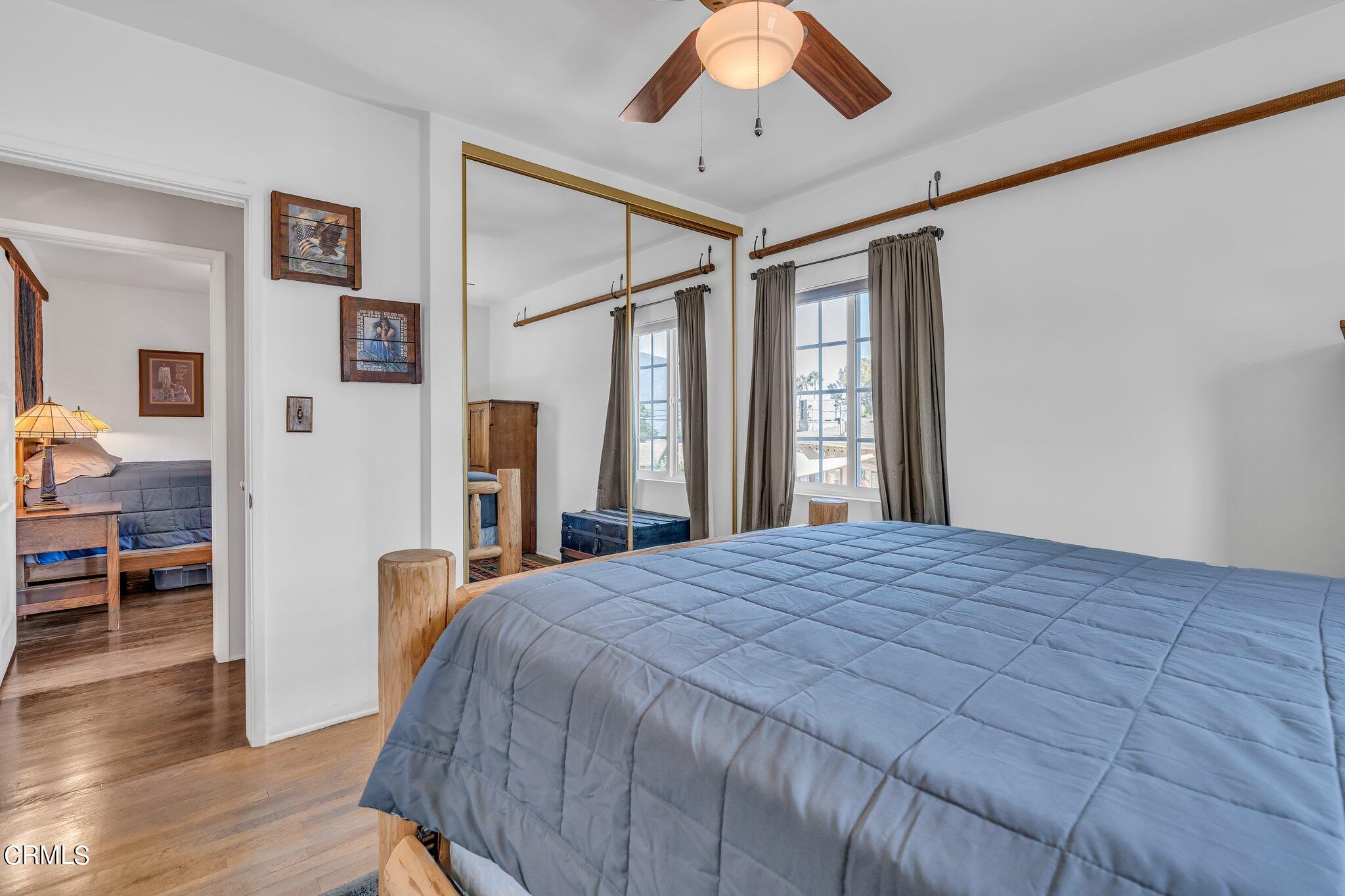 4632 Pennsylvania Avenue La Crescenta, CA 91214 - Photo 22 of 41 a bedroom with a large bed and a large window