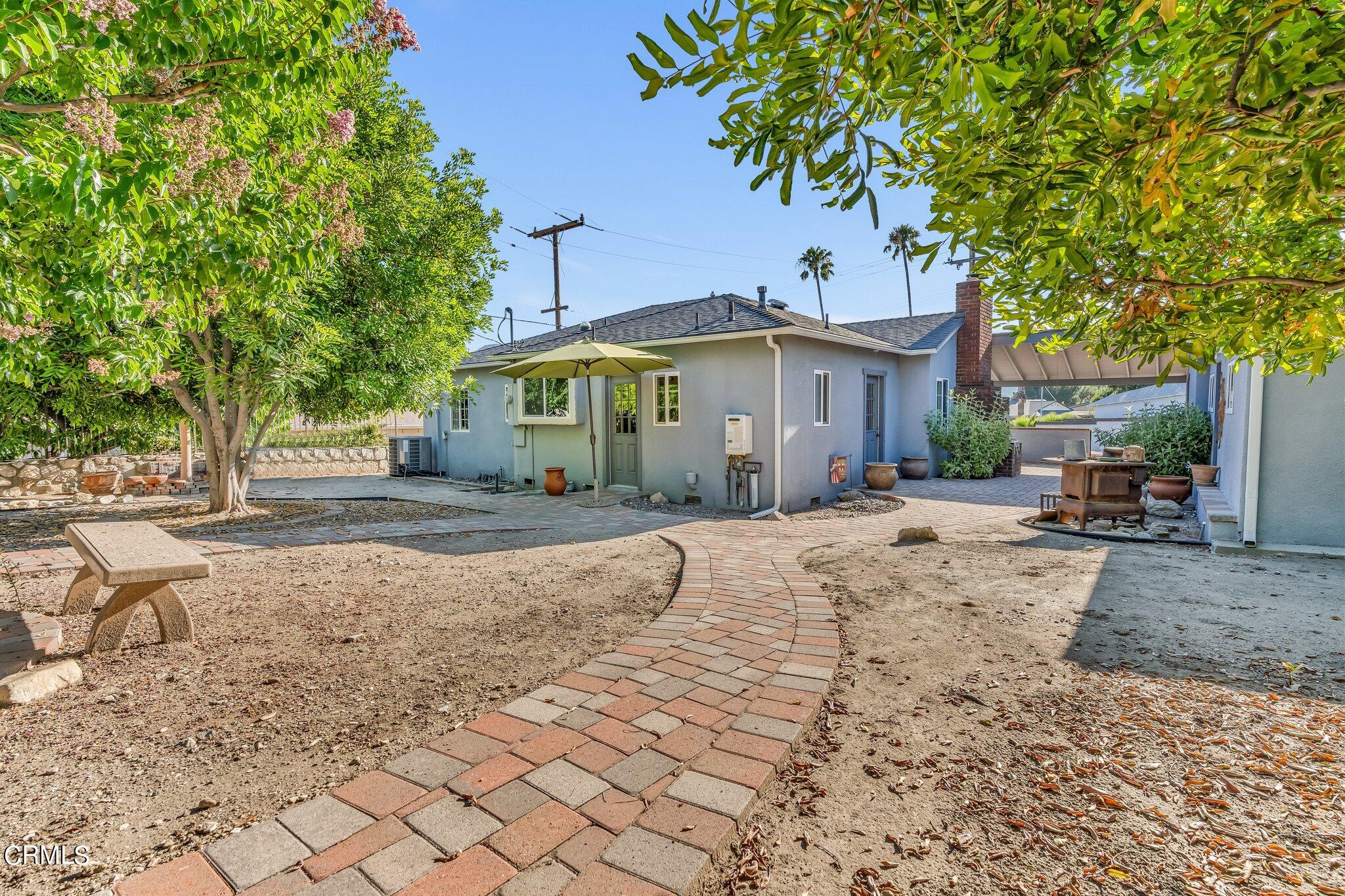 4632 Pennsylvania Avenue La Crescenta, CA 91214 - Photo 29 of 41 a view of a house with a tree in the yard