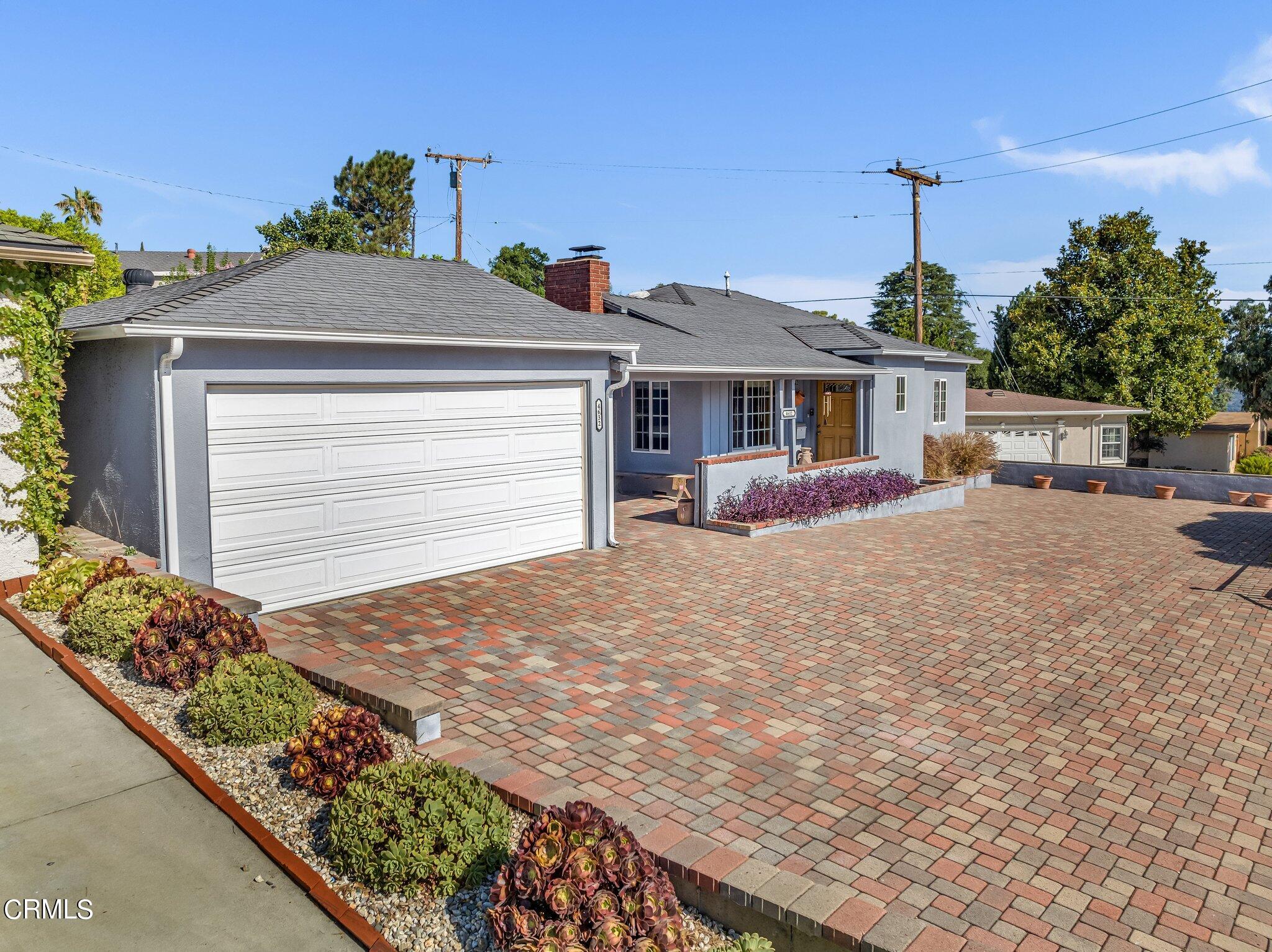 4632 Pennsylvania Avenue La Crescenta, CA 91214 - Photo 31 of 41 a front view of a house with garden