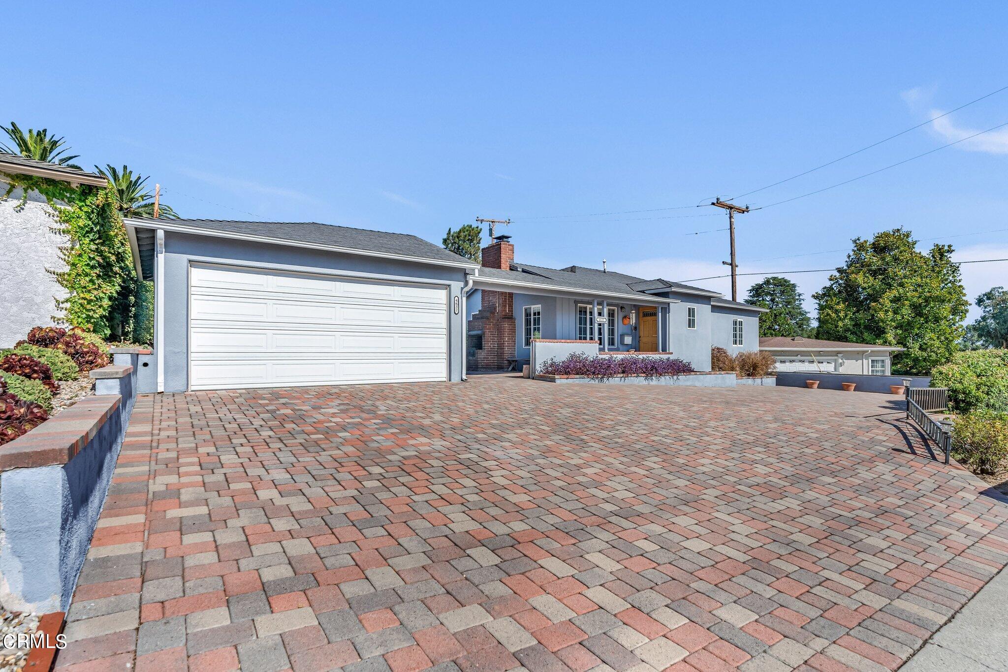 4632 Pennsylvania Avenue La Crescenta, CA 91214 - Photo 36 of 41 a front view of a house with a yard