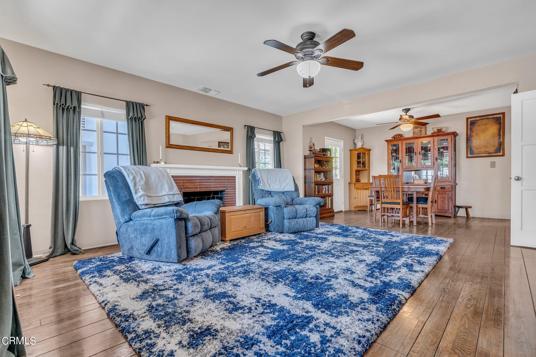 4632 Pennsylvania Avenue La Crescenta, CA 91214 - Photo 4 of 41 a living room with furniture fireplace and wooden floor