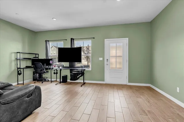 a living room with furniture and a table