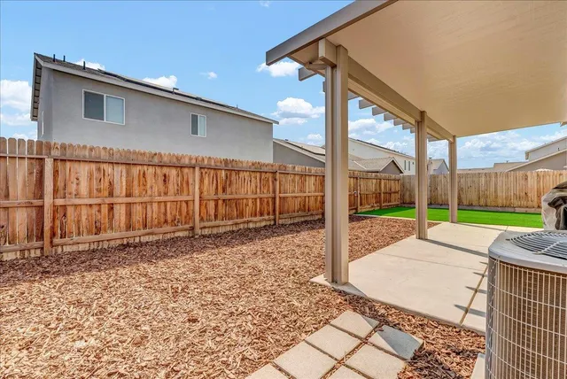 a view of a house with a park