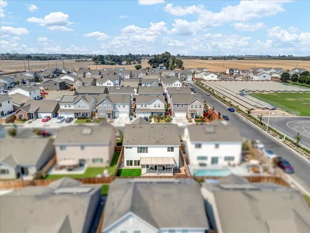 an aerial view of a highlighted house