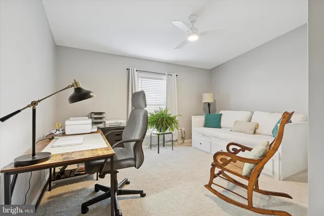a view of a livingroom with furniture and a couch