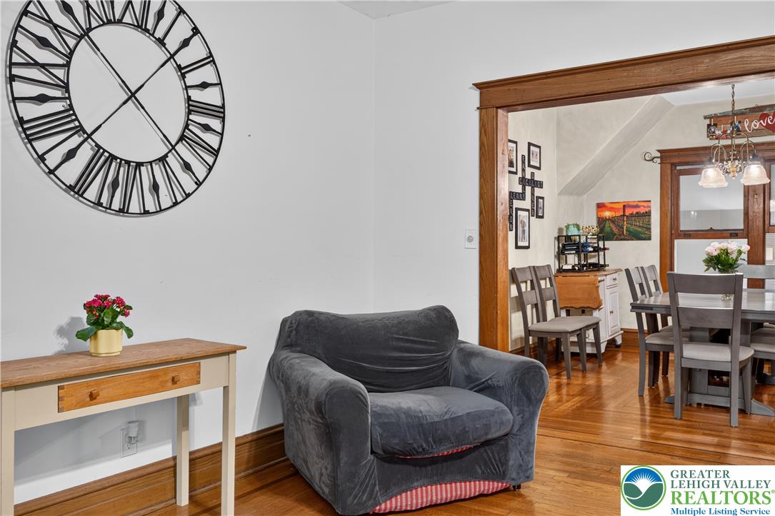 534 Ridge Street Emmaus, PA 18049 - Photo 10 of 40 a living room with furniture a rug and a floor to ceiling window