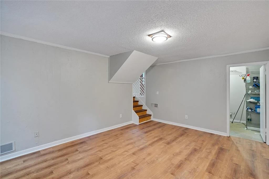 9825 Coleman Road Roswell, GA 30075 - Photo 5 of 17 a view of empty room